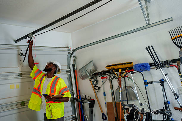 Professional Garage Door Panel Replacement technician working in Millville, UT